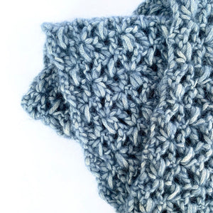 Close-up of Illimani's Amelie Yarn in Denim Blue, crocheted Classic Snood by Erika Knight 